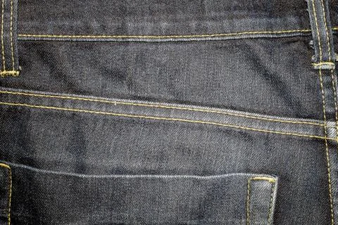 Texture the old jeans. Stock Photos