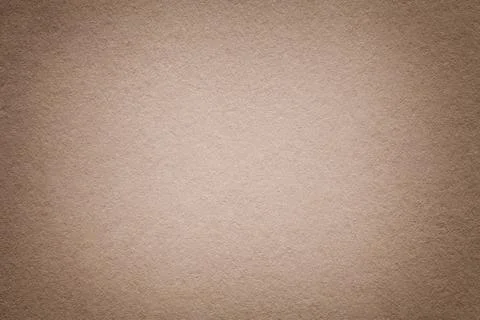 Texture of old light brown paper background, closeup. Structure of dense beig Stock Photos