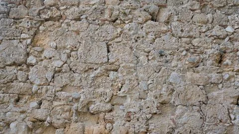 Texture of an old limestone wall Stock Photos