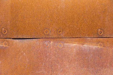 Texture of old metal with corrosion, rust close-up for a photophone Stock Photos