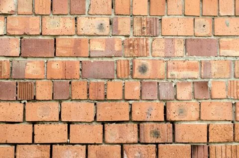 Texture of an old orange brick wall Stock Photos
