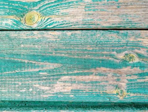 Texture of old painted shabby rustic wooden fence made of planks, with rusty Foto stock