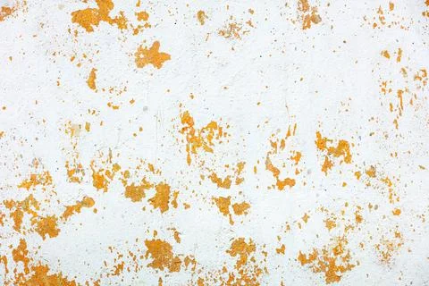 Texture of an old plastered wall with peeling whitewash. Stock Photos