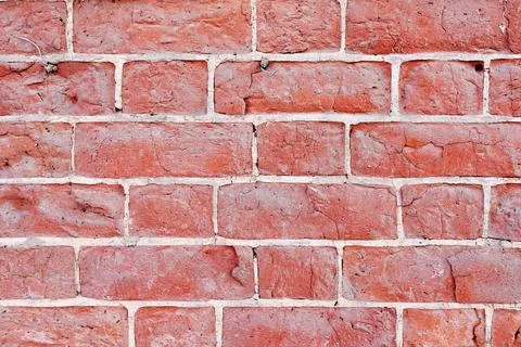 The texture of an old  red brick wall. Close-up, pattern. Stock Photos