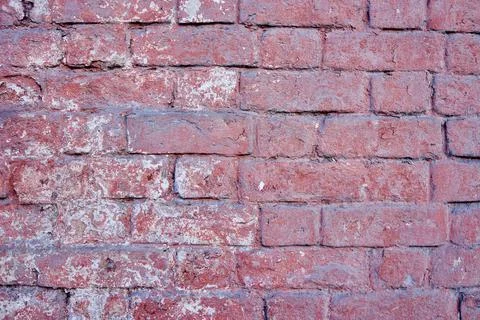 The texture of an old  red brick wall. Close-up, pattern. Stock Photos