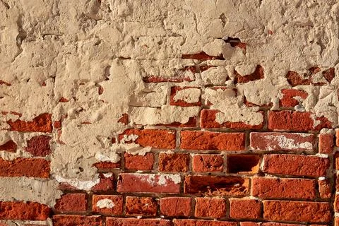 The texture of an old red  brick wall. Close-up, pattern. Stock Photos