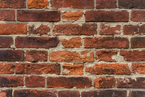Texture of an old red brick wall. Stock Photos