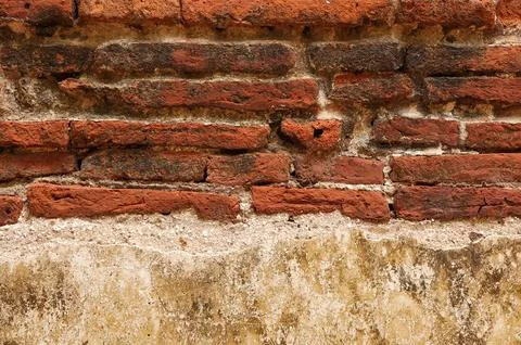 Texture of old red brick wall and texture of concrete.  Stock Photos
