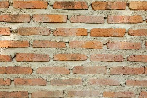 Texture of old red brick wall. background of empty brick wall texture  Stock Photos
