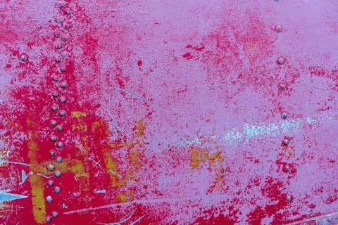 Texture of old red painted weathered steel board with several layers of paint Stock Photos