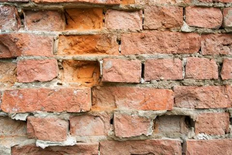 Texture of an old red stone brick wall Stock Photos