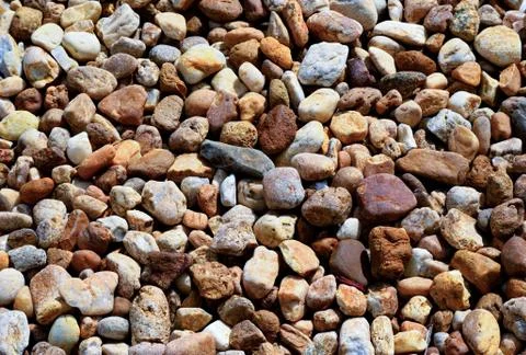 Texture old rock wall made of random stone background. Stock Photos