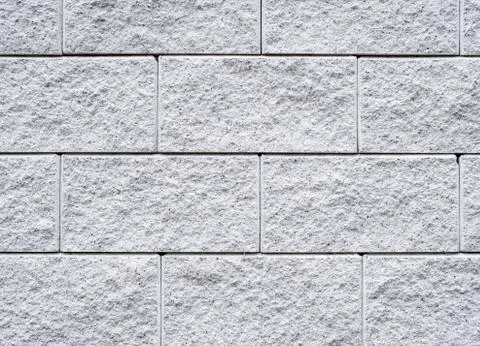 Texture old rock wall made of random stone background. Stock Photos