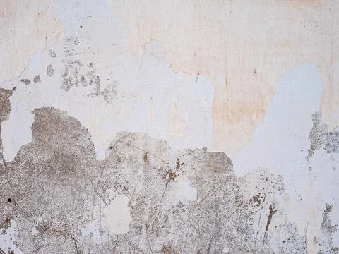 Texture of an old rough concrete wall with peeling paint, cracks and scratche Stock Photos