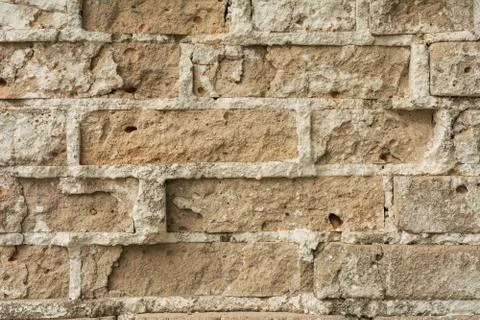 Texture of an old ruined brick wall of an ancient building Fotos de archivo