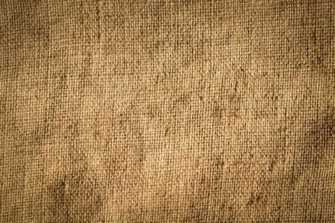 Texture of old rumpled burlap fabric as background. 写真素材