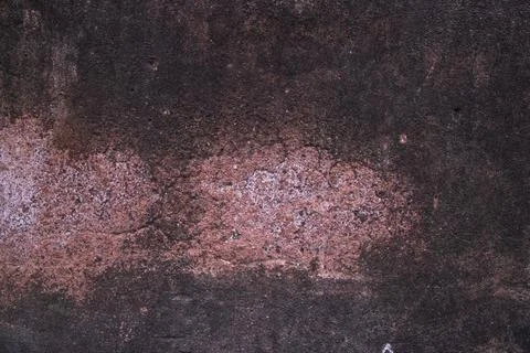 Texture of old rustic wall covered with brown stucco. Abstract background f.. Stock Photos