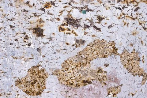 The texture of old rusty metal covered with cracked paint Stock Photos