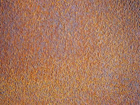 Texture of old rusty red metal at sunset Stock Photos