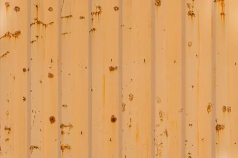 Texture of old an rusty ship container yellow paint starting to fall off Stock Photos