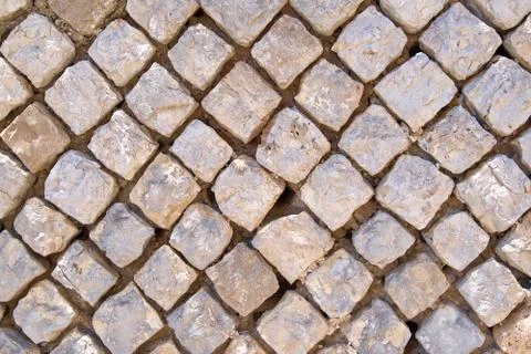 The texture of old squared stones, Background applicable for design Stock Photos