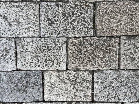 Texture of old stone paved on the road Stock Photos