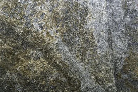 Texture of the Old Stone Wall Covered with Moss Stock Photos