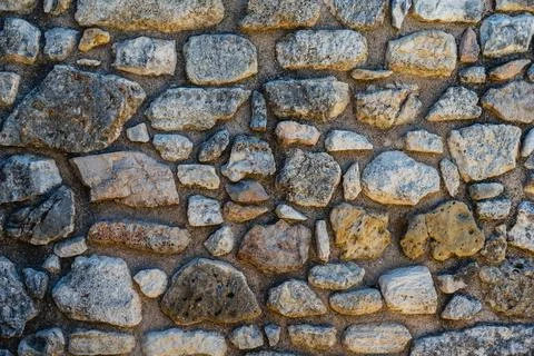Texture of old stone wall made from limestone Foto stock