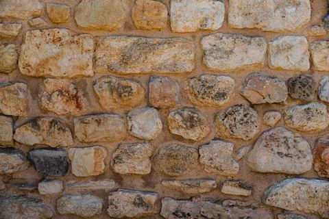 Texture of old stone wall made from limestone Stock Photos