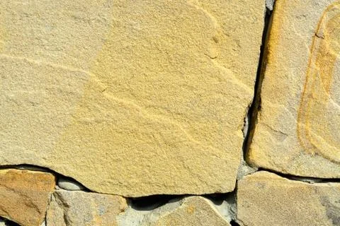 The texture of the old stone wall. Stock Photos