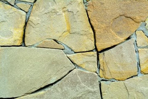 The texture of the old stone wall. Stock Photos