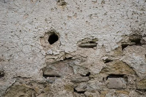 The texture of the old stucco on a brick wall. 写真素材