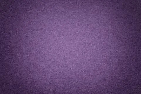 Texture of old violet paper background, closeup. Structure of dense cardboard Foto stock