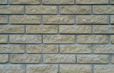 The texture of the old wall from the bricks as background. Stock Photos