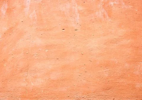 Texture of old wall covered with brown stucco . Stock Photos