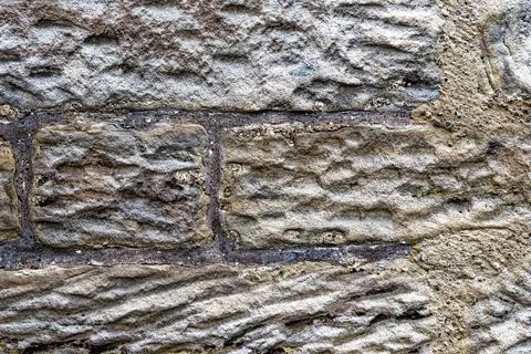 Texture of an old wall with different size stones Stock Photos