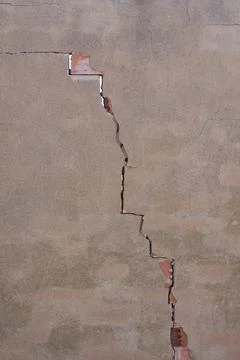 Texture of an old wall with exposed bricks Stock Photos