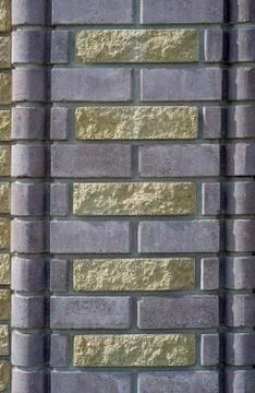The texture of the old wall from gray bricks as background Stock Photos