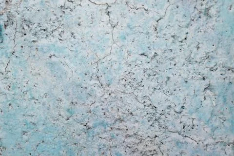 Texture of old wall painted with blue paint, faded with time Stock Photos