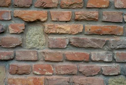 The texture of the old wall from the red bricks as background. Stock Photos