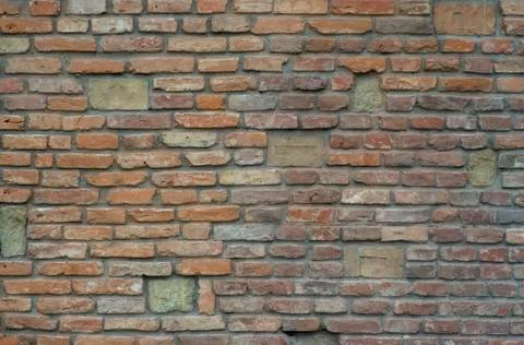 The texture of the old wall from red bricks as background Stock Photos