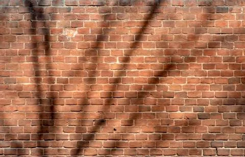 The texture of the old wall from red bricks as background Stock Photos