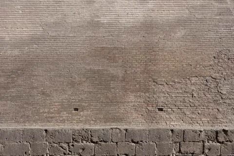 Texture of a Old wall from a stone brick of brown color Foto stock
