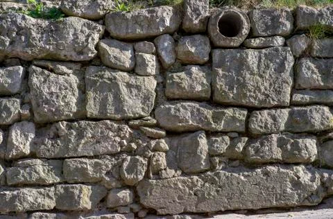 The texture of the old wall from stones as background Stock Photos