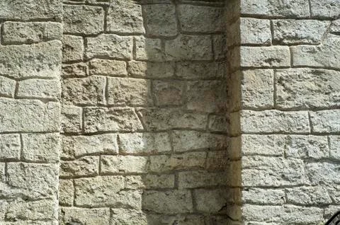 The texture of the old wall from stones as background Stock Photos