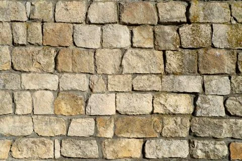 The texture of the old wall from stones as background Stock Photos
