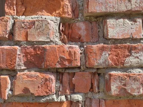 Texture of old weathered brick. Background of old red bricks Stock Photos