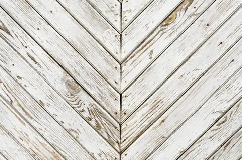 Texture of the old wooden gate which is covered with shabby white paint. Ob.. Stock Photos