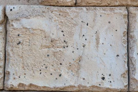 Texture of one wall of gray stone Stock Photos