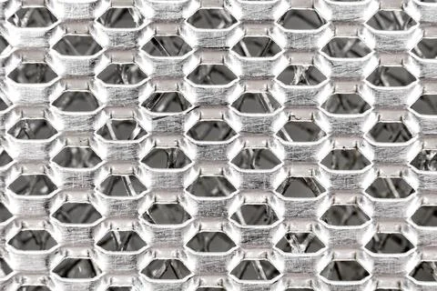 Texture or background of metal mesh with holes. Metal 스톡 사진